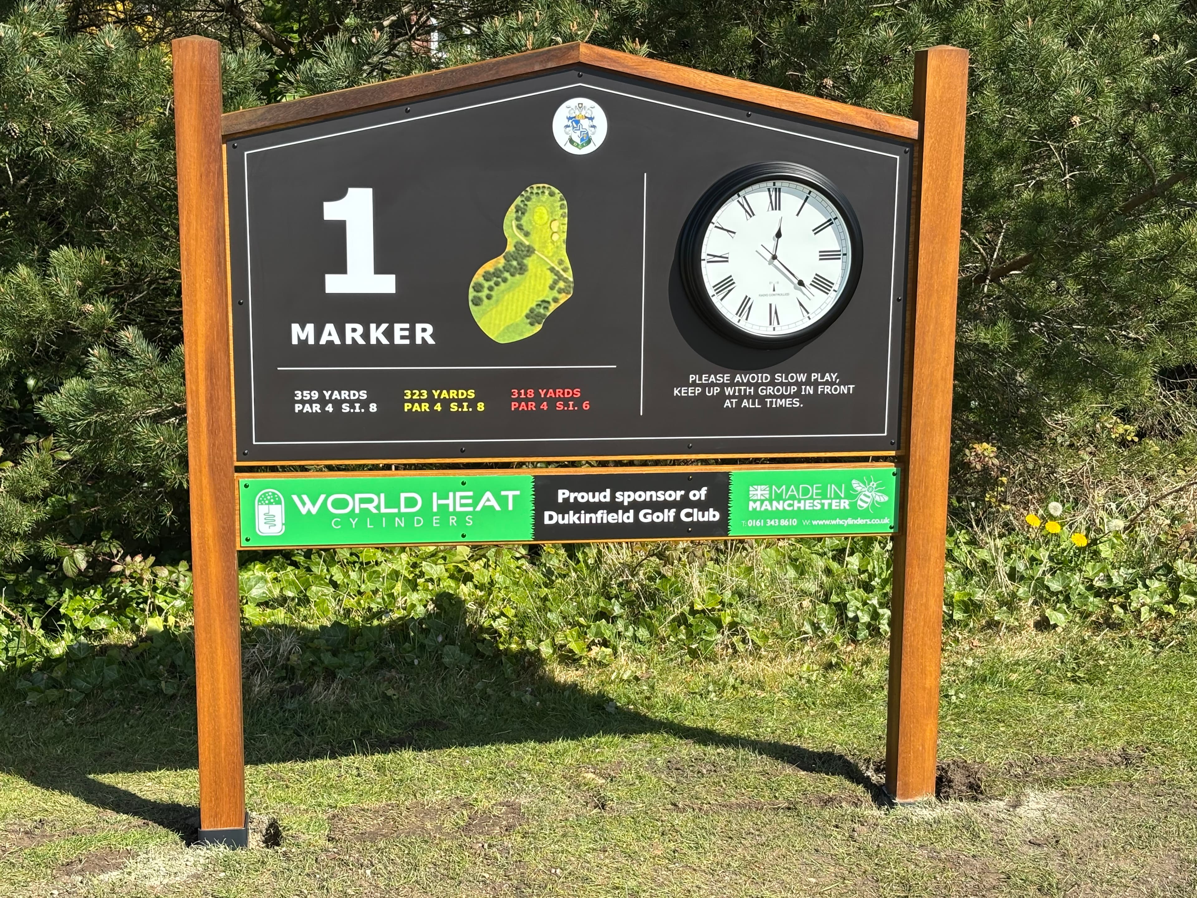 The first tee at Dukinfield golf course with the company logo.